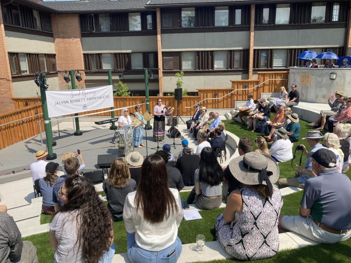 Around 100 people attended the grand opening celebration of the Jalynn Bennett Amphitheatre at Trent University's Catharine Parr Traill College on May 31, 2023, which featured several musical performances including the drum and vocal group Unity.  (Photo: Sebastian Johnston-Lindsay / kawarthaNOW)