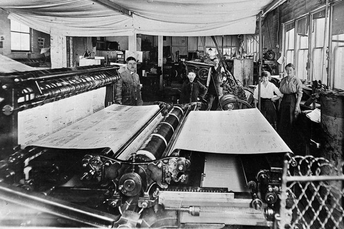 The printing press at The Lindsay Post circa 1910. Kawartha Lakes Museum & Archives project staff are digitizing issues of historial Lindsay newspapers published from 1915 to 1973 and uploading them to the Internet Archive. Along with newspaper issues, the project will digitize 4,000 negatives that belonged to the late journalist, author, and historian Alan Capon. (Photo courtesy of Kawartha Lakes Museum & Archives)