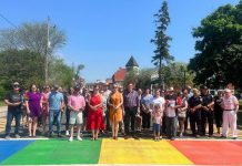 Port Hope mayor Olena Hankivsky, councillors, staff, and members of the community gathered on June 1, 2023 for the official ribbon-cutting ceremony of the new rainbow crosswalk on Queen Street. (Photo: Port Hope Police Service / Facebook)