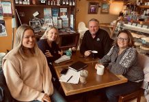 Devon Girard, executive director of Community Futures Peterborough (left), meets with Sarah Budd, president and CEO of Peterborough and the Kawarthas Chamber of Commerce (second from left), along with Peterborough Downtown Business Improvement Area executive director Terry Guiel and Peterborough & the Kawarthas Economic Development president and CEO Rhonda Keenan at Black Honey in downtown Peterborough in January 2023. Since becoming executive director earlier this year, Girard has been strengthening partnerships with the area’s other economic development organizations to enhance the ecosystem for Peterborough-area entrepreneurs. (Photo courtesy of Terry Guiel)