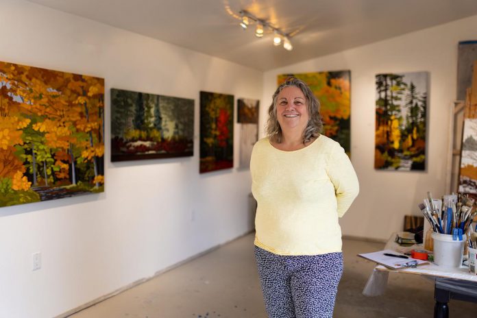 Leanne Baird in her Peterborough studio, which is Tour Stop 2 on the 2023 Kawartha Autumn Studio Tour running from 10 a.m. to 5 p.m. on September 23 and 24. The visual artist is one of the 47 artists participating in the 39th annual self-guided tour. (Photo: Zach Ward / WeDesign)