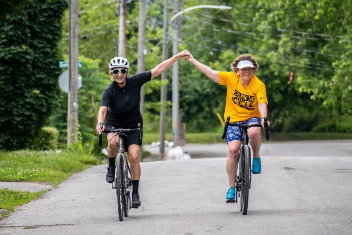 Two of the more than 60 cyclists and volunteers who participated in the Canadian Mental Health Association Haliburton, Kawartha, Pine Ridge's 'Change the Cycle' fundraiser at Nicholls Oval Park in Peterborough on June 24, 2023. The event raised over $40,000 for the organization's supportive housing Garden Homes Project, which aims to support vulnerable people at risk of homelessness in the Peterborough area by providing affordable, small homes. (Photo courtesy of CMHA HKPR)