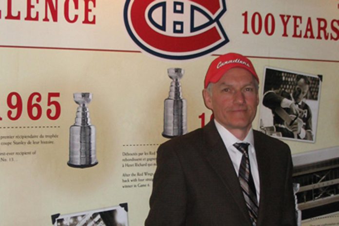 D'Arcy Jenish outside the Montreal Canadiens' dressing room at the Bell Centre in Montreal, one of many visits to the Bell Centre to see games and interview active and retired players, coaches, executives, sportswriters, broadcasters, and fans while researching his 2008 book "The Montreal Canadiens: 100 Years of Glory." (Photo: D'Arcy Jenish website)