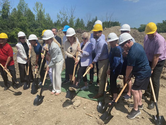 Ontario Minister of the Environment, Conservation and Parks David Piccini (second yellow hard hat from right) joined a number of local dignitaries for a groundbreaking ceremony on July 5, 2023 at the site of the new Ontario Turtle Conservation Centre in Peterborough. Siblings Mary and Gerry Young have donated their family's 100-acre property off Television Road for the new centre, which is scheduled to open in July 2024. (Photo: Paul Rellinger / kawarthaNOW)