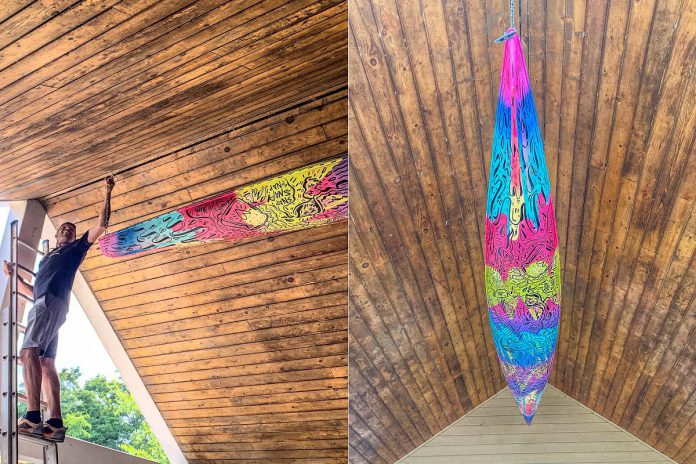 A painted kayak created by Peterborough artist Jason Wilkins hangs in the Silver Bean Cafe in Millennium Park. (Photos: Silver Bean Cafe / Facebook)