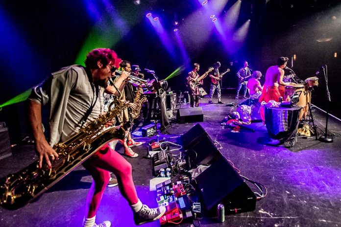 Vancouver-based band Five Alarm Funk brings its 'punk funk' to the Peterborough Musicfest stage in a free-admission concert at Del Crary Park on July 12, 2023. (Photo: Michael Caswell / Scene In The Dark)