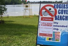 Peterborough Public Health closed beaches at Rogers Cove and Beavermead Park in Peterborough on July 14, 2023 due to possibly harmful blue-green algae blooms. (Photo: Bruce Head / kawarthaNOW)
