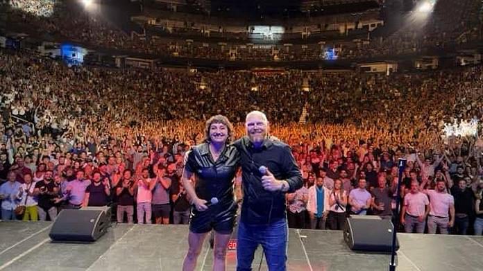 Comedian Steph Tolev pictured with American comedian Bill Burr, for whom she opened at Toronto's Scotiabank Arena last August. (Photo courtesy of Steph Tolev)