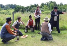 Actors Logan Coombes, Colin A. Doyle, Mark Hiscox, Josh Lambert, Robert Morrison, and Kelsey Powell perform a scene from "The Cavan Blazers" during 4th Line Theatre's media day on July 19, 2023. The play, which chronicles the 19th-century conflict between Cavan Township's Protestant and Catholic Irish settlers, runs Tuesdays to Saturdays from August 1 to 26 at the Winslow Farm in Millbrook. (Photo: Heather Doughty / kawarthaNOW)