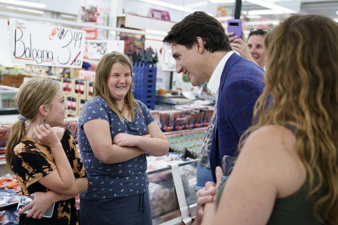 Prime Minister Justin Trudeau chats with customers of Farmboy Markets on Lansdowne Street during a visit to Peterborough on July 20, 2023. (Photo: Justin Trudeau / Facebook)