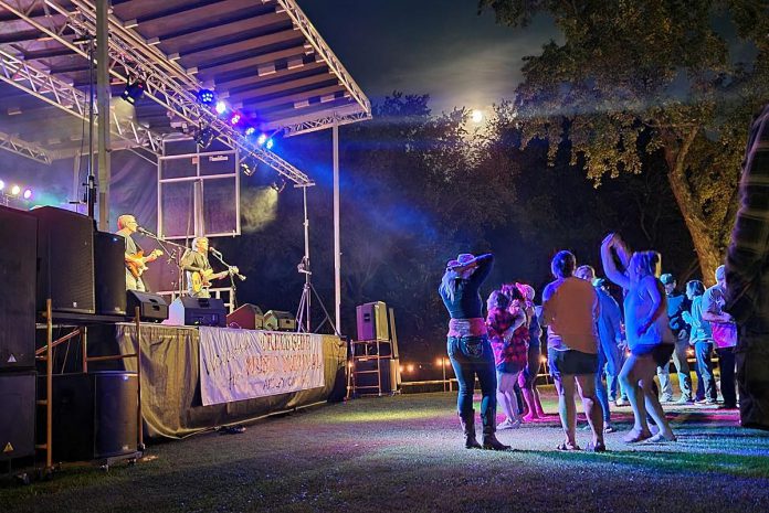 Attendees enjoy a performance at a previous Creekside Music Festival in Apsley. Dwayne Gretzky, Canada's best cover band, will headline the 2023 festival from 8:30 to 10 p.m. on Saturday, September 9. (Photo: Creekside Music Festival)