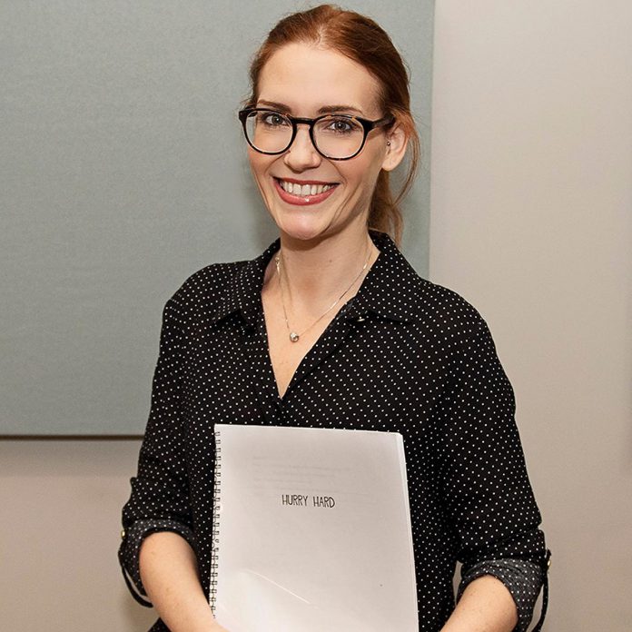 Canadian playwright Kristen Da Silva with her award-winning script for "Hurry Hard," which was commissioned through the playwright development program of Port Dover's Lighthouse Festival, where it premiered in July 2019. That fall, it went on to win the Stage West Award for best new comedy at the Tom Hendry Awards, handed out in Toronto by the Playwrights Guild of Canada. (Photo: Lighthouse Festival)