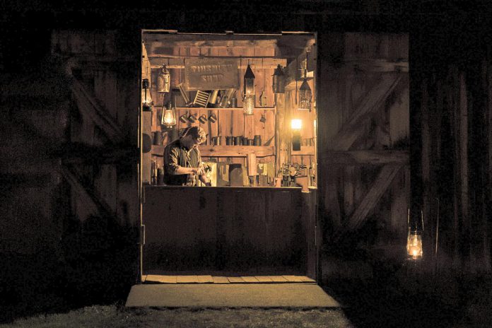 You can learn how the village tinsmith assisted 19th-century settler families with their nighttime preparations during "Village by Lantern Light" at Lang Pioneer Village Museum in Keene on August 12, 2023. (Photo: Heather Doughty Photography).