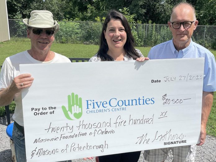 Lyn Giles of Five Counties Children's Centre (middle) accepts a $20,500 donation from Masons Steve Kirton (left) and Drew Wilson made by the Peterborough District Masonic Association and and the Masonic Foundation of Ontario. The funds will go directly to help more children and youth access speech and occupational therapies at Five Counties Children's Centre. (Photo courtesy of Five Counties Children's Centre)