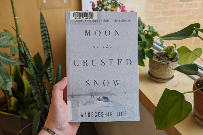 "Moon of the Crusted Snow" by Waubgeshig Rice, a 2018 post-apocalyptic thriller set in a small Anishinaabe community, was chosen earlier this year for the Peterborough Public Library's inaugural "One Book, One Ptbo" event. The event aims to build community through a shared reading experience, and culminates with a public reading by the author in Peterborough on November 15, 2023. (Photo courtesy of Peterborough Public Library)