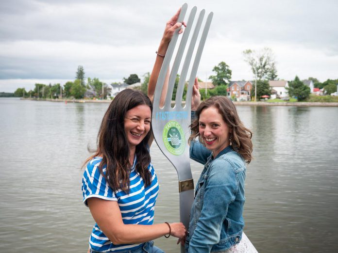 Kawarthas Northumberland is promoting its Taste of the Trent-Severn Waterway (TSW) culinary tourism program with a giant fork that's over six feet tall. Pictured at Campbellford's The Dockside Bistro, the giant fork will be passed between businesses participating in the program, both providing a fun photo opportunity for guests and the potential to win fun prizes from some of the businesses. (Photo courtesy of Kawarthas Northumberland / RTO8)
