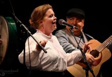 Sacha Law and John Eaton of Shipyard Kitchen Party perform in "Tom Thomson's Wake," a folk musical portrait of the famed early 20th-century Canadian landscape artist as told from the perspective of three people who were close with Thomson: A.Y. Jackson (Craig Ashton), Lowery "Larry" Dickson (Dean Hollin), and Winnie Trainer (Julie LeBlanc). Also featuring musicians Jason Murphy, Victoria Yeh, and Jason Redman, the production will be performed at Showplace Performance Centre in Peterborough on September 23, 2023 and at the Concert Hall at Victoria Hall in Cobourg on September 30, 2023. (Photo: Trevor Hesselink, Groundswell Photography)