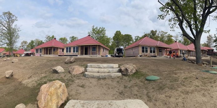 The new cabins under construction at Viamede Resort on Stoney Lake. Managed by Peterborough's Mortlock Construction Inc. and completed in six months, the rebuild project involved 41 local subcontractors, designers, and suppliers. (Photo courtesy of Mortlock Construction)