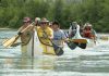 The Canadian Voyageur Brigade Society paddling in British Columbia in 2007, when the society was known as the David Thompson Brigade. On August 5, 2023, the Canadian Voyageur Brigade Society will arrive in Peterborough during a 250-kilometre journey from Port Severn to Hiawatha First Nation at Rice Lake. (Photo: Canadian Voyageur Brigade Society)