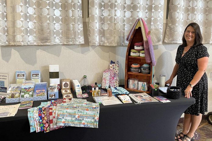 Tracey Minnema, owner of River of Yarn, displays her wares at a Women's Business Network of Peterborough (WBN) monthly meeting. The meetings provide an opportunity for members to set up their own vendor booths to share their businesses and services with other professional women. (Photo courtesy of WBN)