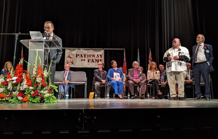 Photographer and social advocate Charlie Gregory (second from right) received the inaugural Barb Bell Humanity Award at the 26th annual Peterborough & District Pathway of Fame at Showplace Performance Centre on September 9, 2023. (Photo: Bruce Head / kawarthaNOW)