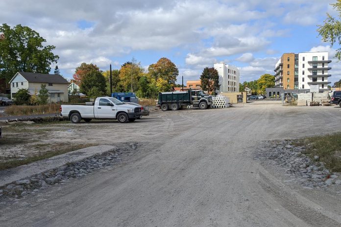 Looking north from Robinson Street just east of the Rotary Greenway Trail, where Ashburnham Realty will develop a six-storey residential building. (Photo: Bruce Head / kawarthaNOW) 