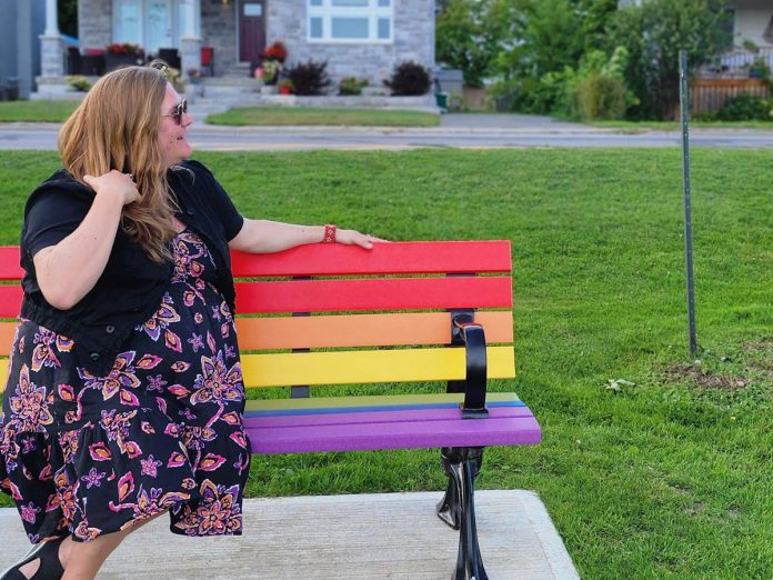 "Everyone is welcome on my bench," wrote East City resident Ashley Bonner on social media during Peterborough Pride Week, reflecting her passion for building community, for which she will be recognized with a "Top 4 Under 40" Peterborough Business Excellence Award from the Peterborough and the Kawarthas Chamber of Commerce on October 18, 2023. In 2020, Bonner combined her passion with her experience in both social work and social media to create a community hub on Facebook for her neighbours to offer and ask for help of each other during the pandemic. (Photo courtesy of Ashley Bonner)