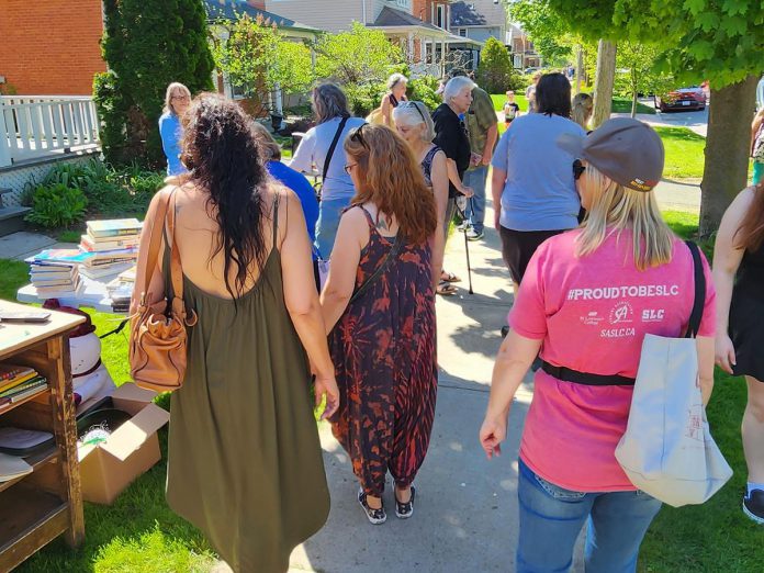 Each Mother's Day weekend, Ashley Bonner organizes the East City neighbourhood yard sale. This year, local businesses participated in the community initiative alongside upwards of 90 residential houses. Visitors come from as far as Toronto to browse through the sale items. (Photo courtesy of Ashley Bonner)