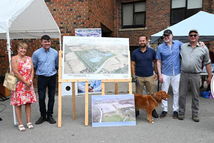 At its 70th anniversary barbeque on August 26, 2023, Campbellford Memorial Hospital unveiled the first rendering of its proposed "Campus of Care" to be located on County Road 30 just west of Campbellford. Pictured from left to right are Campbellford Memorial Hospital board chair Carrie Hayward, Trent Hills deputy major Michael Metcalf, Northumberland-Peterborough South MPP David Piccini, Campbellford Memorial Hospital CEO Jeff Hohenkerk, and Jim Curle, who donated the land for the Campus of Care site. (Photo courtesy of Campbellford Memorial Hospital)