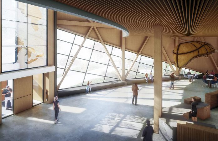 The new Canadian Canoe Museum's atrium will welcome visitors and the public to refresh and refuel before their next adventure. It features a reception area, store, café, fireplace, and an artisan workshop to witness the art of canoe-making and restoration first-hand, and a view into the Collection Hall. (Rendering: Lett Architects)