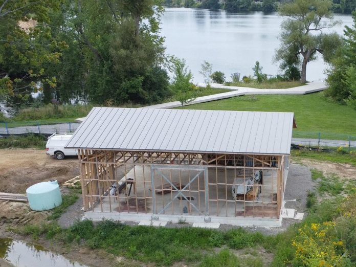The completed steel roof of the Canoe House, located beside the Trans Canada Trail running through Beavermead Park and steps from Little Lake, at the new Canadian Canoe Museum under construction at 2077 Ashburnham Drive in Peterborough. The Canoe House will host daily canoe and kayak rentals and will also be used as a programming and event space. (Photo courtesy of The Canadian Canoe Museum)