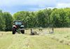 James Harley, co-owner of Harley Farms in Keene, cuts hay. While the agriculture sector is highly vulnerable to the impacts of climate change, it also produces 10 per cent of Canada's greenhouse gas emissions, not including the use of fossil fuels. The Net Zero Farms pilot project will subsidize a cohort of local agriculture businesses to join Green Economy Peterborough, where they will be supported to measure their footprint, learn from one another, and expand our regional understanding of local opportunities for climate action. (Photo: Veronica Price Jones / Harley Farms)