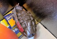 A person found this grenade in a firearms safe in their deceased father's Selwyn Township home on August 31, 2023. The person contacted Peterborough County OPP who subsequently consulted with the Department of National Defence, with a military bomb technician ultimately disposing of the grenade. (Police-supplied photo)