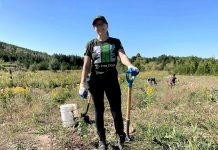 One of the 50 volunteers who gathered at Otonabee Conservation's Harold Town Conservation Area off Old Norwood Road in Peterborough on September 16, 2023 to plant 350 trees and shrubs supported by TD Tree Days. (Photo courtesy of Otonabee Conservation)