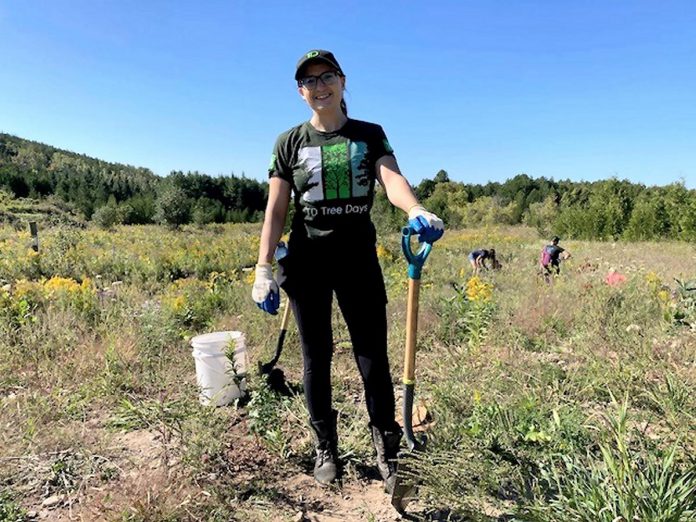 One of the 50 volunteers who gathered at Otonabee Conservation's Harold Town Conservation Area off Old Norwood Road in Peterborough on September 16, 2023 to plant 350 trees and shrubs supported by TD Tree Days. (Photo courtesy of Otonabee Conservation)