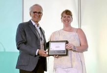 Peter Singer, vice chair of Food Banks Canada's board of directors, presented the Excellence in Food Banking Award to Kawartha Lakes Food Source executive director Heather Kirby at Food Banks Canada's 2023 National Conference in Edmonton, Alberta on June 27, 2023. (Photo courtesy of Food Banks Canada)