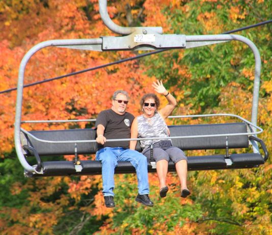 From celebrating the fall harvest to riding the midway at a fall fair to watching a spooky play, there are plenty of family activities to enjoy across the Kawarthas region during October, including soaking in the fall colours with a scenic chairlift ride at Sir Sam's Ski / Ride on Eagle Lake near Haliburton during the resort's annual fall colour festival. (Photo: Sir Sam's)