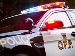 An Ontario Provincial Police (OPP) police car with lights flashing. (Photo: OPP)