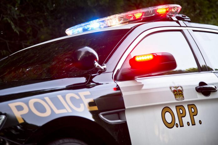 An Ontario Provincial Police (OPP) police car with lights flashing. (Photo: OPP)