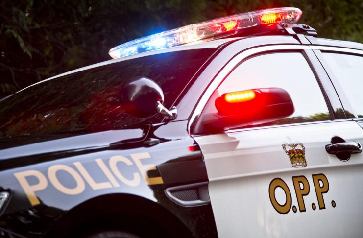 An Ontario Provincial Police (OPP) police car with lights flashing. (Photo: OPP)