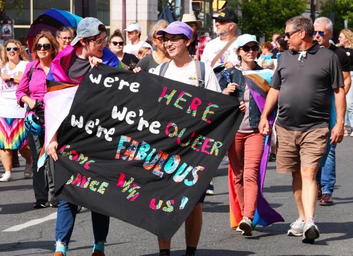 "We're here, we're queer, we're fabulous. Come dance with us!" reads a banner at the Peterborough-Nogojiwanong Pride Parade held on September 23, 2023 in downtown Peterborough. (Photo courtesy of Sean Bruce)