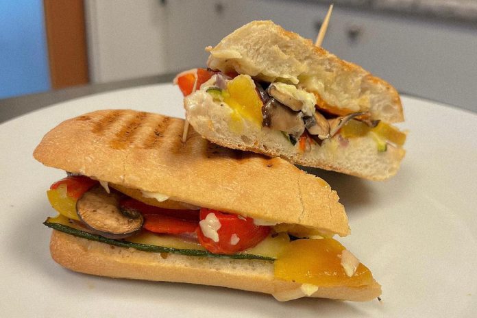 As the weather gets colder, The Good Baker will soon re-introduce a modified take on their popular roasted vegetable panini. The sandwich is made with roasted peppers, zucchini, sweet potato, carrot, onion, sauteed mushrooms, and onions, and topped with old cheddar and creamy garlic aioli. The sandwich comes on a grilled ciabatta bun (a gluten-free options is available) and served with a salad or soup of the day. (Photo courtesy of The Good Baker)