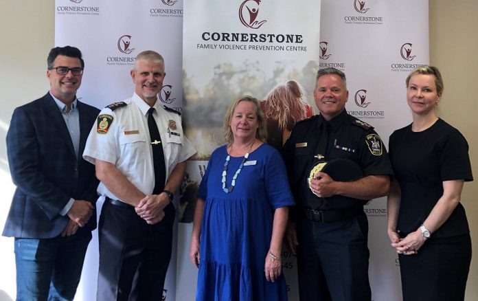 Cobourg mayor Lucas Cleveland, Cobourg police chief Paul VandeGraaf, Cornerstone Family Violence Prevention Centre executive director Nancy Johnston, Port Hope police chief Tim Farquharson, and Port Hope mayor Olena Hankivsky during an announcement on October 5, 2023 of a $100,000 provincial grant that Cobourg police and Cornerstone will use to expand their intimate partner abuse program first piloted in 2017. (Photo courtesy of Cobourg Police Service)