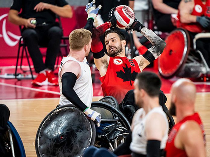 Peterborough wheelchair rugby athlete Cody Caldwell with the ball when Canada took on Great Britain in the preliminary round during the Tokyo 2020 Paralympic Games. (Photo: Canadian Paralympic Committee)