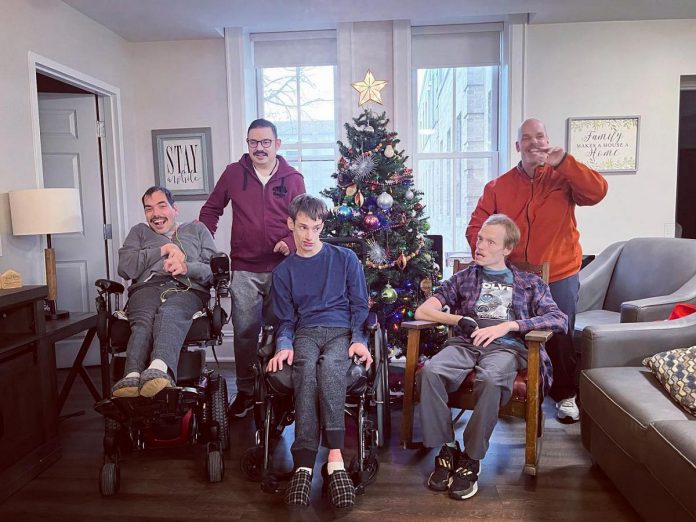 The five residents of the all-male residence created by Peterborough non-profit organization Shared Dreams for Independent Living (back left to front right): Scott Kalbfleisch, Jason O'Donoghue, Sean Ellis, Christopher Cannon, and Matthew Elliot. The Girl Power project hopes to learn from the experience of the organization, a parent-led initiative that formed in 2013 to create a residential option for five adult men living with a disability. (Photo courtesy of Shared Dreams for Independent Living)