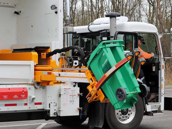 Beginning October 31, 2023, the City of Peterborough will begin weekly collection of organic waste in green bins supplied to eligible households, on the same day as recycling collection. Specially designed trucks will use a mechanical arm to pick up and empty the green bins. As of October 31, regular garbage will only be collected every other week and must be placed at the curb in clear garbage bags rather than garbage bins. (Photo: City of Peterborough)