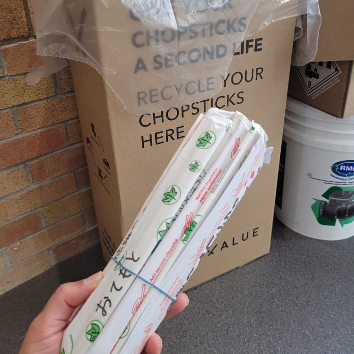 Chopsticks being dropped off at the Peterborough Public Library to be upcycled into furniture and cutting boards through ChopValue. (Photo: Adeilah Dahlke / Jigsaw Organizing Solutions)