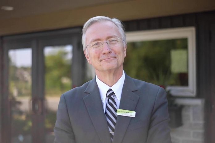 John Cunningham, owner of Community Alternative Funeral & Cremations Services Ltd., Ashburnham Funeral Home & Reception Centre, and Kawartha Aquamation, was named Business Citizen of the Year at the Peterborough and the Kawarthas Chamber of Commerce's 2023 Business Excellence Awards at Showplace Performance Centre in downtown Peterborough on October 18, 2023. (kawarthaNOW screenshot of Chamber video)