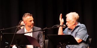 New Stages Theatre Company's founding artistic director Randy Read (right) with Sergio Di Zio during a staged reading of Rick Chafe's "The Secret Mask" in May 2023. In Read's first return to the stage since suffering a serious injury the previous fall, he performed as a man recovering from a stroke. Read's 25 years at the helm of New Stages will be celebrated in the cabaret show "Let's Get Randy" at the Market Hall in downtown Peterborough on November 17, 2023. (Photo: Andy Carroll)