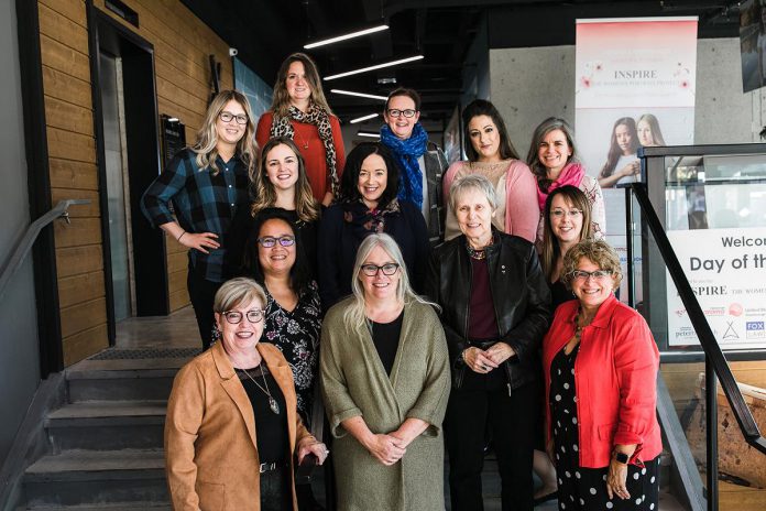 Fox Law was a sponsor for the 2019 Day of the Girl photography exhibit for Inspire: The Women's Portrait Project, which featured Dr. Roberta Bondar (second from right, bottom), Canada's first female astronaut and the world's first neurologist in space, as the guest speaker. Lawyer and partner Nicole Truman (centre, middle row) has been a part of the project since it first founded by photographer Heather Doughty (centre, bottom row) and is currently president of the board. Truman says lending her knowledge to organizations she has a passion for is her way to give back to the community. (Photo: Inspire)